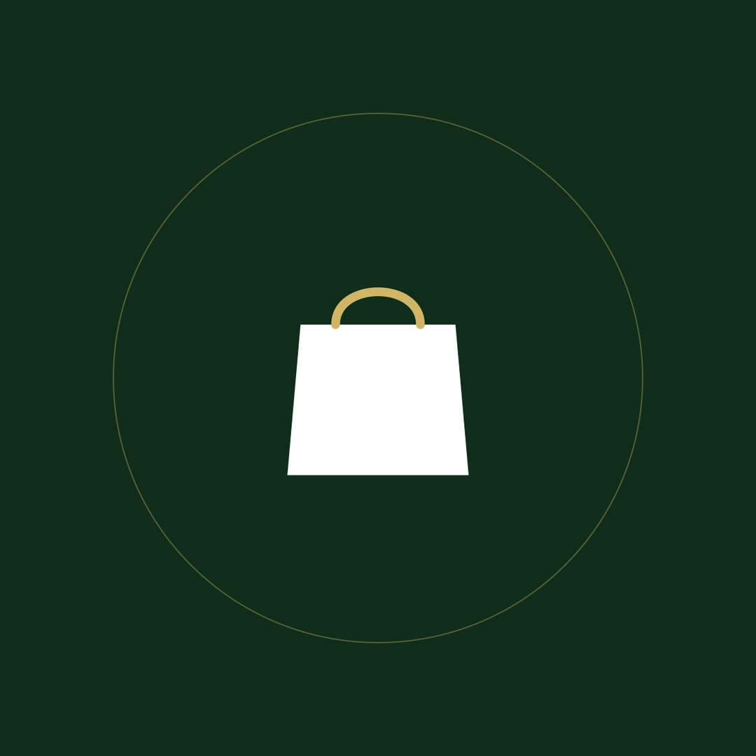 A shopping bag with a gold handle