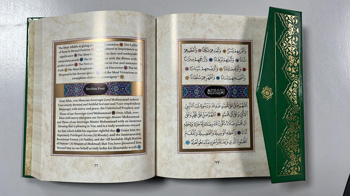 Interior spread showing the Arabic text with facing English translation
